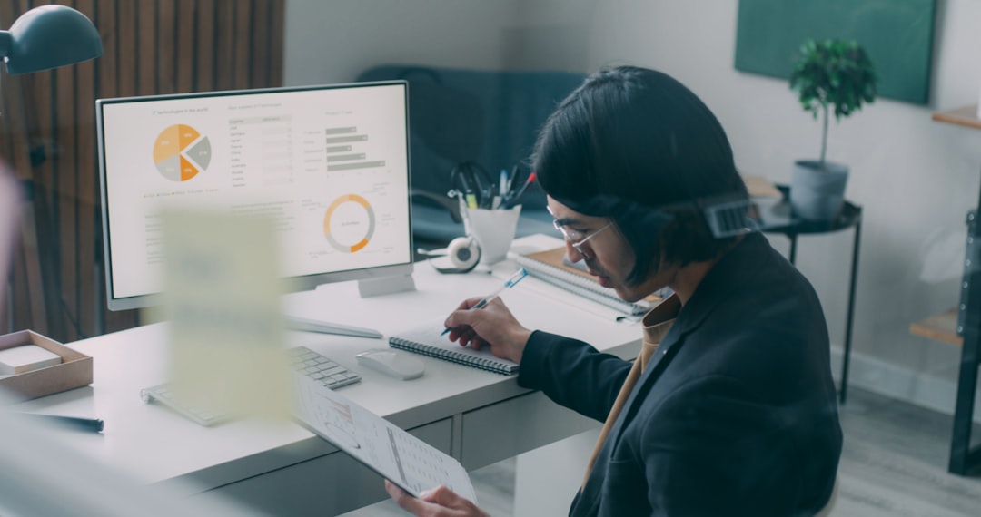 Professional using modern business software on a computer for a QuickBooks review